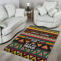 Rectangular African pattern area rug with bright triangles and centered text design