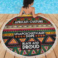Round beach blanket with fringe edge, African pattern and slogan text on deck