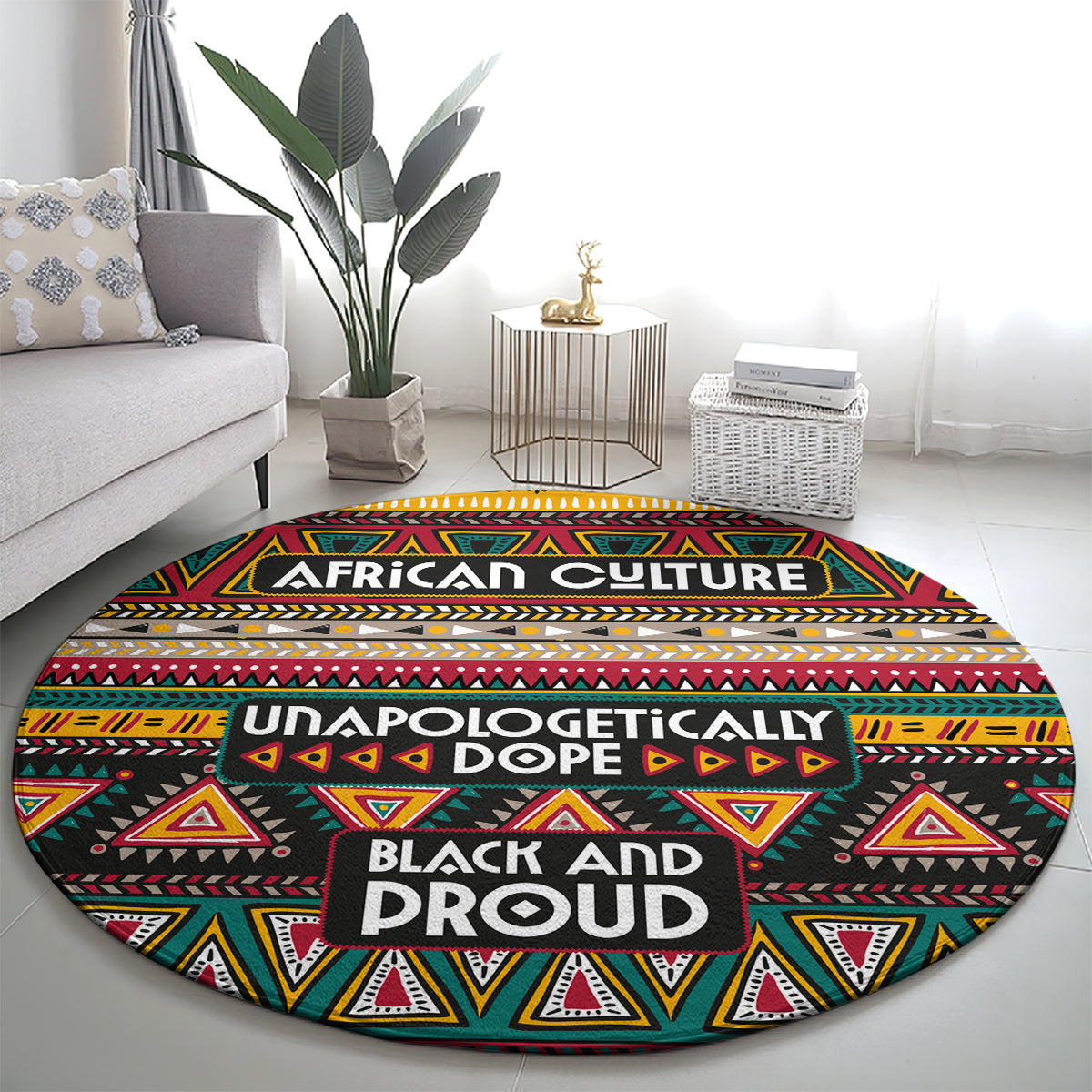 Round African-pattern carpet on floor, black base with red yellow green triangles and layered text bands.