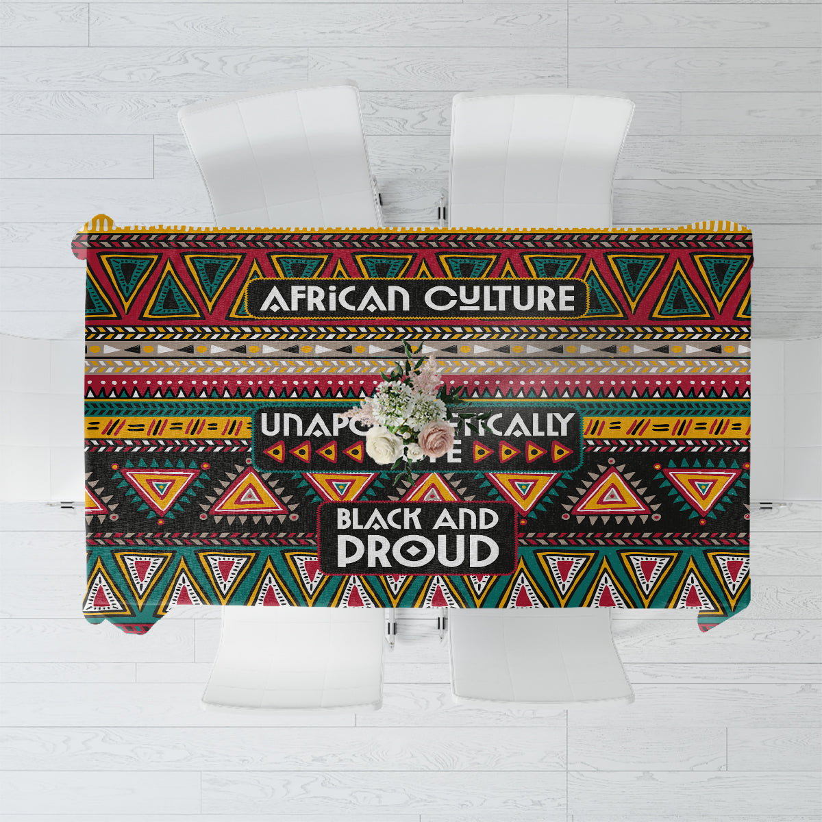Geometric African-style tablecloth, dark base with colorful triangle and stripe pattern along the edge