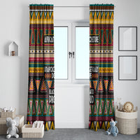 Colorful patterned window curtain panels hanging on each side of a white doorway