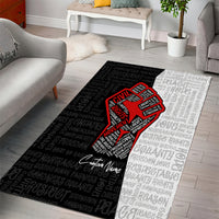 Civil rights area rug with red fist graphic and black-to-gray repeating word pattern
