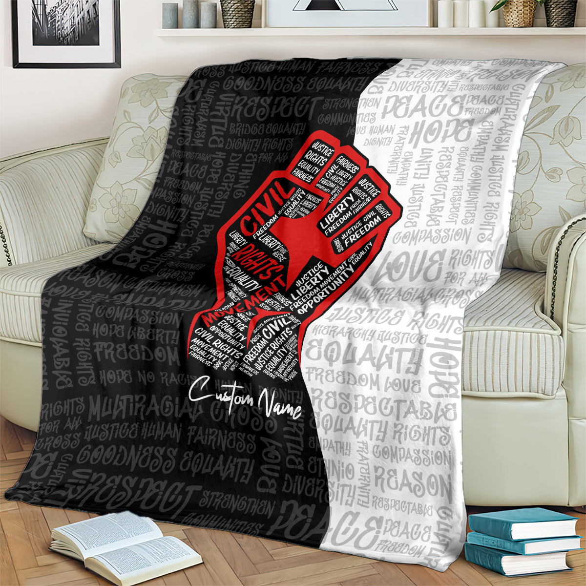 Black and gray blanket with red justice fist graphic and repeating text pattern, custom name