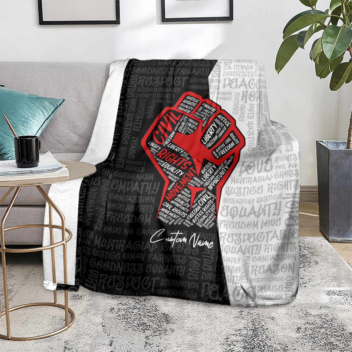 Gray and white blanket with red justice fist graphic and repeating text pattern, custom name