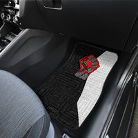 Single car mat with black text pattern, white insert, and red justice fist emblem
