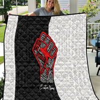Personalized civil rights movement quilt with large red fist emblem on black center and white border
