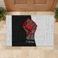 Personalized civil rights movement doormat with red justice fist graphic on dark background