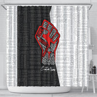 Personalized shower curtain featuring a red justice fist icon over gray word pattern