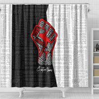 Personalized shower curtain with red justice fist graphic and dense gray typographic pattern