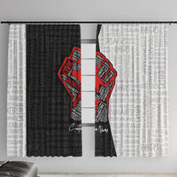 Front view of window curtain panels featuring red justice fist logo on black-and-white text