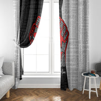 Hanging window curtain with black typography print and red justice fist emblem on gray-white text
