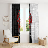 Window curtain panels in black and gray text design with red justice fist centerpiece