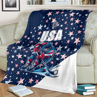 USA ice hockey blanket on sofa, navy top and white bottom with USA and star accents
