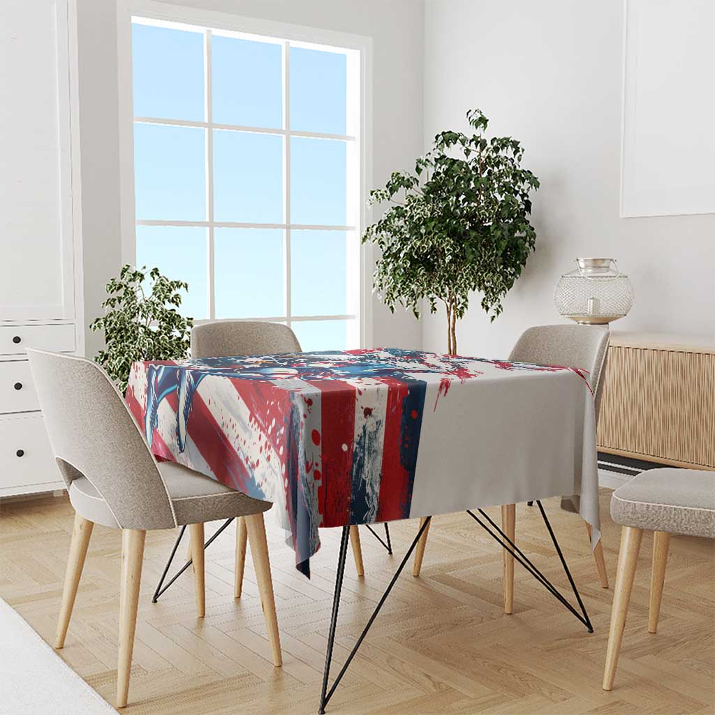 Rugby-themed tablecloth draped over dining table, red blue and white art print