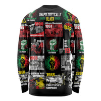 Back of black long-sleeve shirt with poster collage graphic and header text