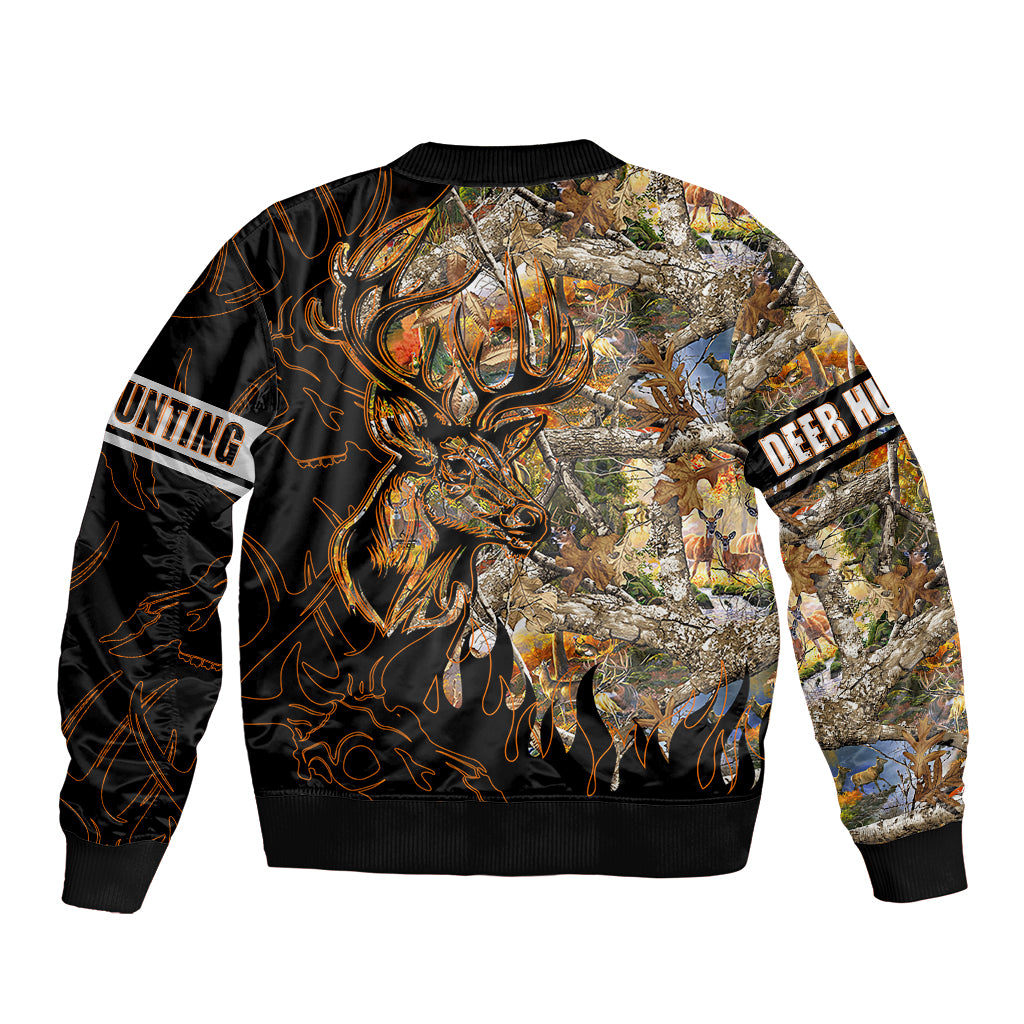 Black bomber jacket with deer head and hunting scene graphic, ribbed hem.
