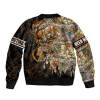 Black bomber jacket with deer head and hunting scene graphic, ribbed hem.