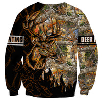 Unisex crewneck sweatshirt with deer head graphic over woodland camo, black and orange
