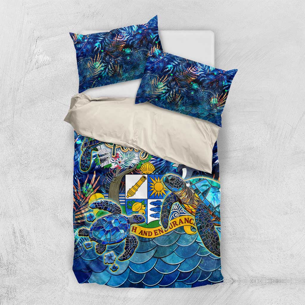Blue ocean bedding set flat lay with duvet and two pillowcases, sea turtle design.