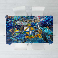 Blue tablecloth with colorful ocean-themed print and scalloped scale pattern