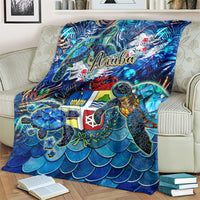 Blue sea turtle throw blanket with Aruba logo and island flag design