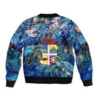Blue bomber jacket back view with sea turtle tropical artwork, zip front, ribbed cuffs