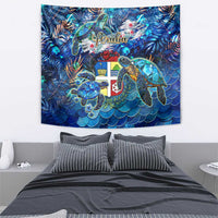 Blue tropical sea turtle tapestry with Aruba logo, colorful shields, and wave scales.