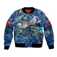 Unisex bomber jacket with blue sea turtle tropical print, front zip and black rib trim