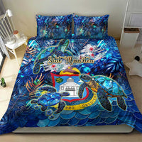 Blue tropical bedding set featuring sea turtles, crest graphics, and two pillowcases
