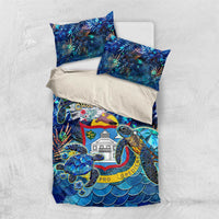 Blue tropical bedding set with sea turtle artwork and included pillowcases on white sheet