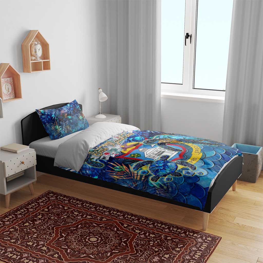 Blue tropical bedding set with sea turtle print duvet and two matching pillowcases on bed