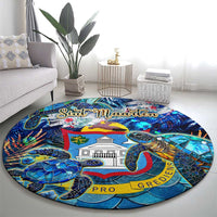 Round blue sea turtle tropical rug with Sint Maarten sign, house center, and PRO lettering