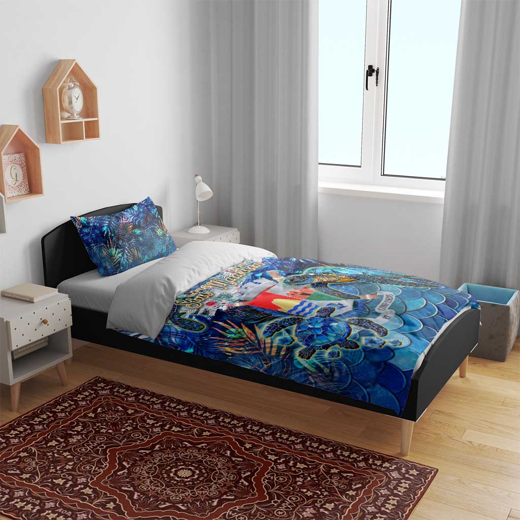 Blue sea turtle tropical bedding set with duvet and two matching pillows on bed