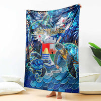 Blue sea turtle tropical blanket featuring sea turtle and wave scales with Sint Maarten text
