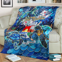 Blue sea turtle tropical blanket with sea turtle, waves and Sint Maarten logo across front