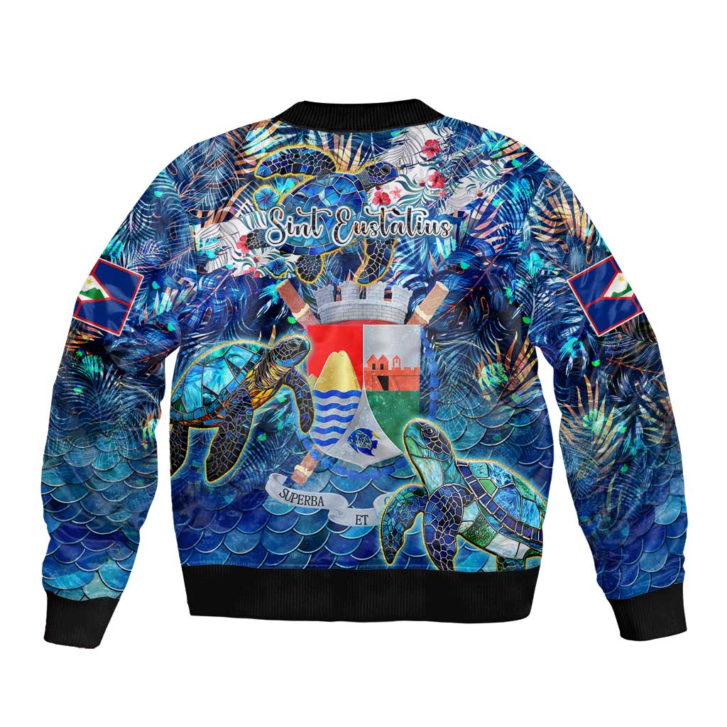 Blue bomber jacket with sea turtle tropical graphic, ribbed crew neck and hem