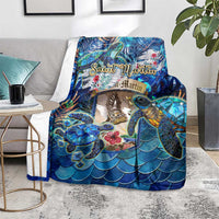 Blue sea turtle tropical blanket on chair, blue wave-scale design with turtles and flowers