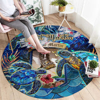 Blue round sea turtle area rug with tropical reef medallion pattern, smoothed by hand