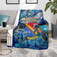 Blue sea turtle tropical pattern blanket covering couch, colorful turtle and stripe motif