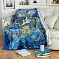Blue sea turtle blanket with tropical pattern and Saba text