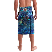Blue tropical swim shorts with sea turtle and scale pattern, back