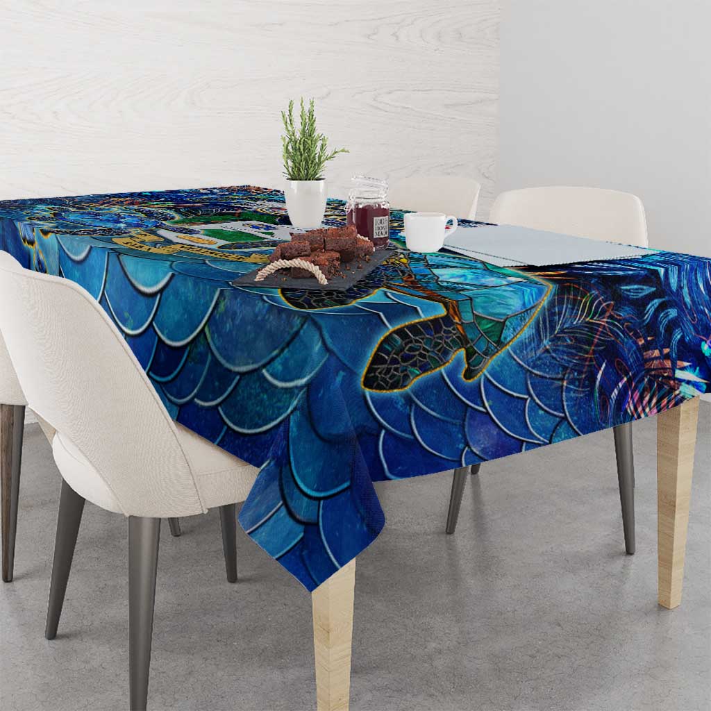 Blue sea turtle tablecloth with scalloped wave pattern, corner drape over table