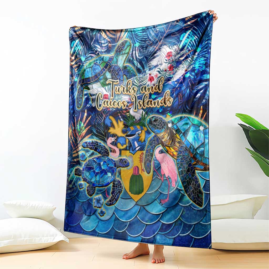 Blue tropical sea turtle blanket with “Turks and Caicos Islands” lettering and colorful ocean animals