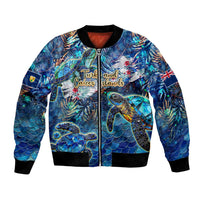 Unisex blue bomber jacket with sea turtle tropical graphic, full-zip, black ribbed cuffs