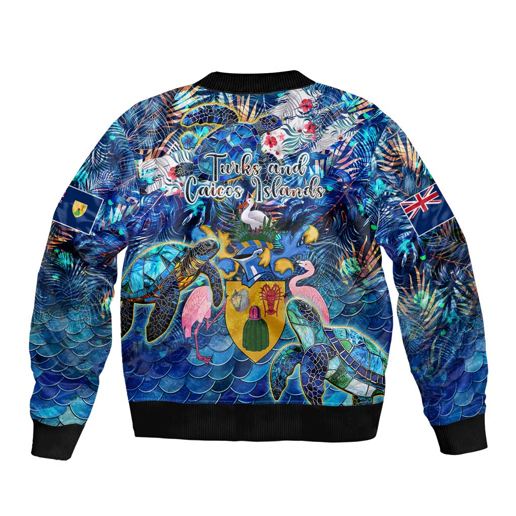 Unisex blue bomber jacket with sea turtle tropical back graphic, ribbed cuffs and hem
