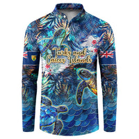 Blue button sweatshirt with sea turtle tropical graphic and mermaid-scale pattern