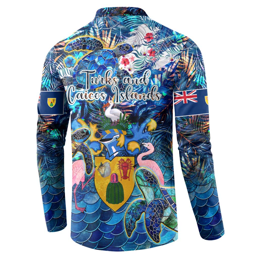 Blue button sweatshirt back with sea turtle collage, tropical flowers, and island-style text