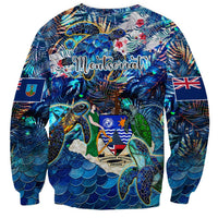 Unisex crewneck sweatshirt, blue tropical sea turtle print with patches and crest graphic