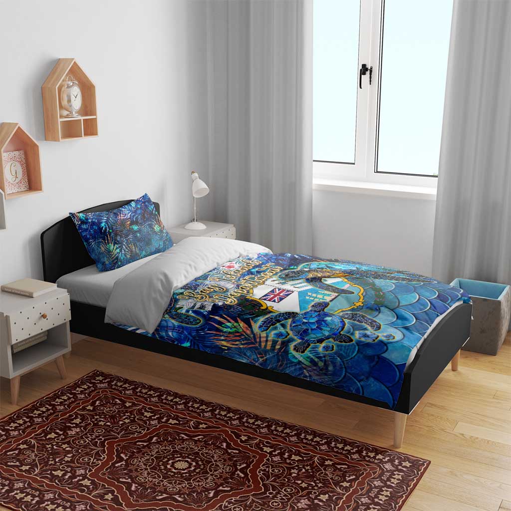 Blue sea turtle bedding on bed with matching pillows and duvet cover, tropical pattern