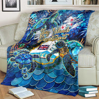 Blue sea turtle tropical blanket showing “Bay Islands Department” text and turtle illustration